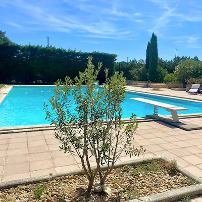 The swimming pool and its diving board